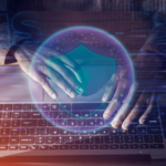 Hands typing on a computer