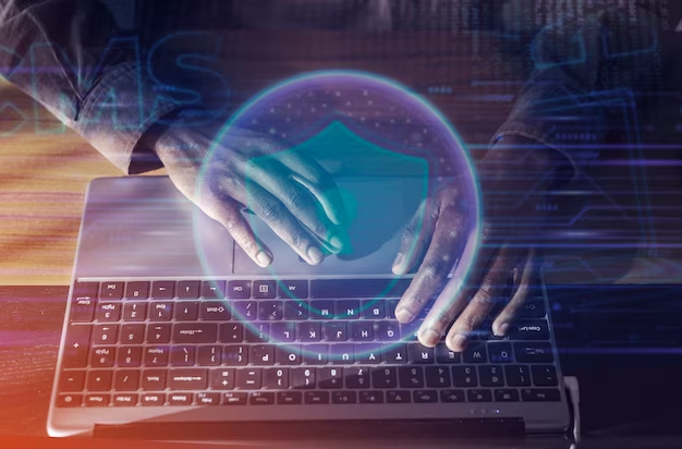 Hands typing on a computer