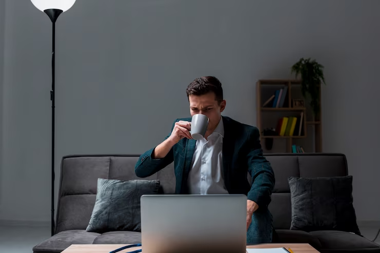 Man Working In Laptop from Home